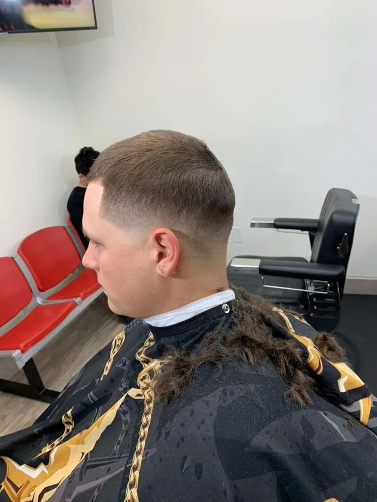 Short crop with a skin fade, length kept long at the back, cut at The Cave Hype in North Phoenix